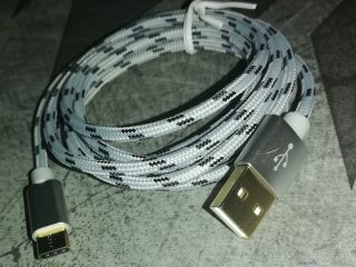 Premium USB Typ A zu Type-C Daten/Ladekabel, 1.5m Silber mit grau/schwarz braiding.